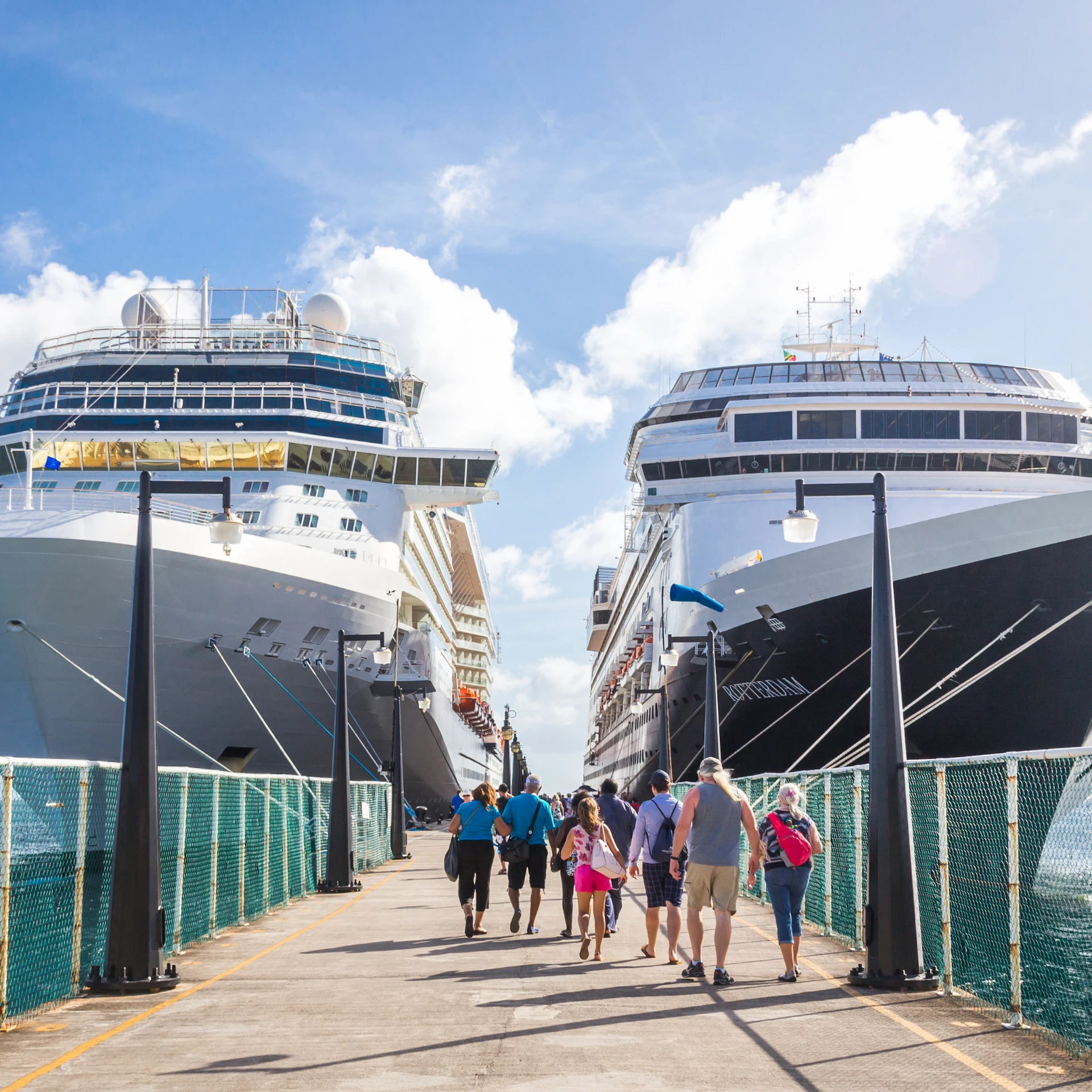 Travel Insurance - People Walking to Cruise Ships